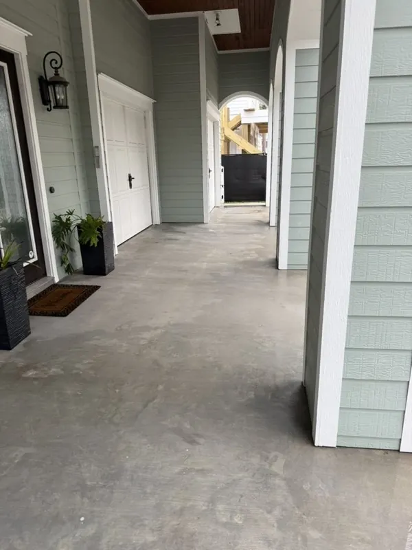 Washed covered entry walkway
