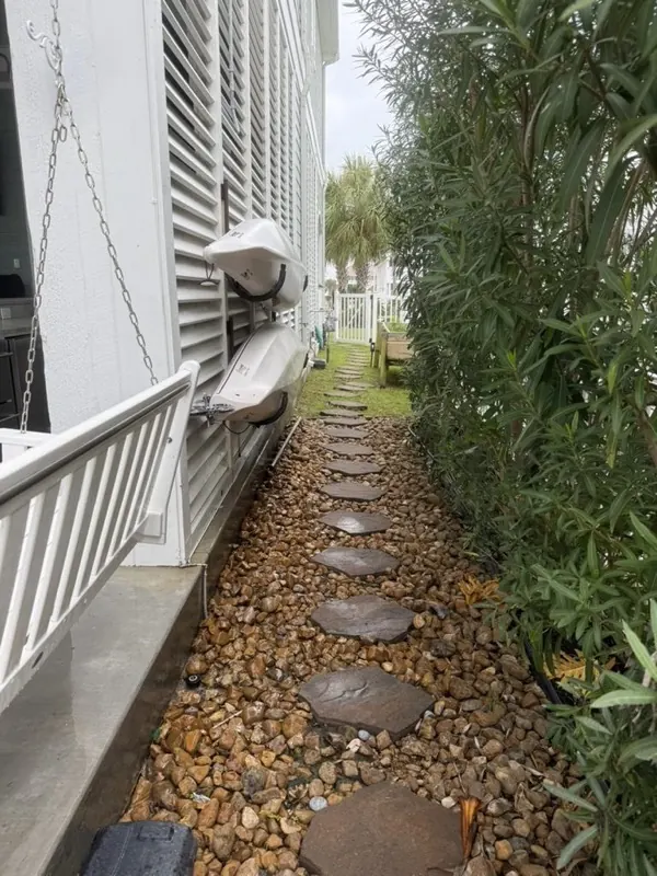 Rinsed stepping-stone side path along the house